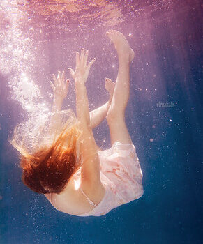 "Falling" by Elena Kalis is licensed under CC BY-NC-ND 2.0.